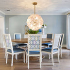 Modern Brass Pink Hydrangea Globe Pendant Light in Elegant Dining Area