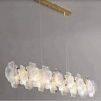 Illuminated Modern Brass and Pink-Purple Hydrangea Petal Art Glass Linear Chandelier Studio Shot