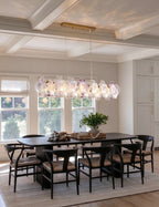 Modern Brass Hydrangea Petal Linear Chandelier in Elegant Dining Setting