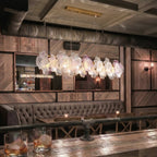 Modern Brass Hydrangea Petal Linear Chandelier in Retro Lounge Bar Setting