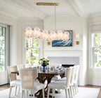 Modern Brass Hydrangea Petal Linear Chandelier in Contemporary Dining Area