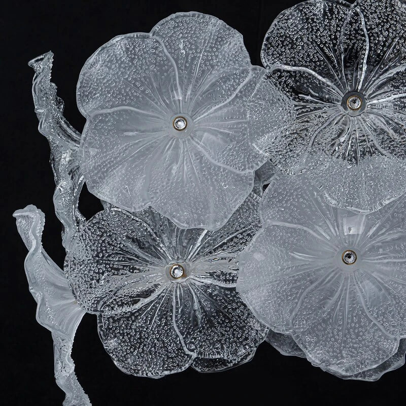 Illuminated Modern Brass Hydrangea Petal Art Glass Linear Chandelier Studio Shot on Dark Background