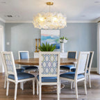 Modern Brass Hydrangea Chandelier Over Round Dining Table