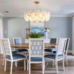 Modern White Rounded Petal Art Glass Multi-Tier Chandelier Over Round Dining Table