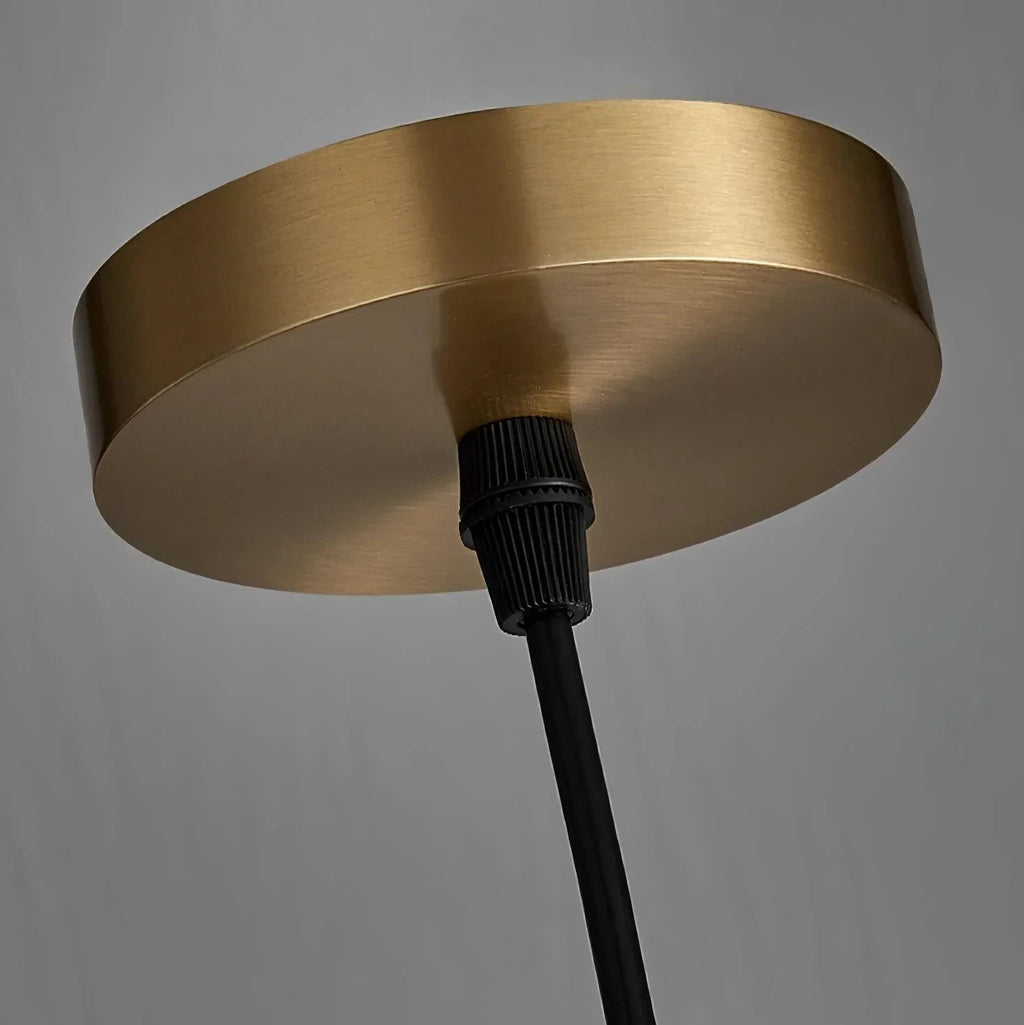 Close Up View of Brass Canopy and Suspension Hardware