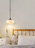 Modern Alabaster Pendant Light Over Bedroom Bedside
