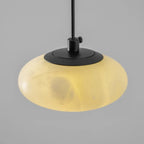 Angled View of Illuminated Modern Flat Round Alabaster Pendant Light