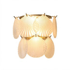 Modern Brass and Shell Art Glass Wall Sconce with Gold Canopy on Pure White Background