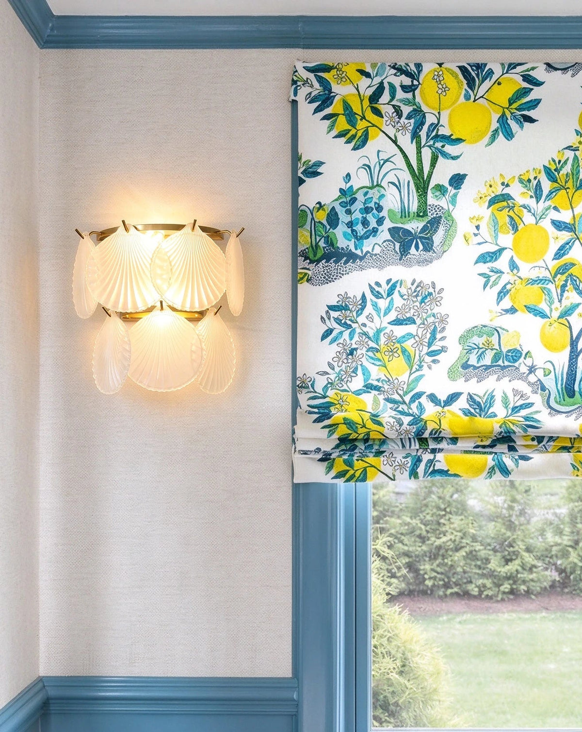 Modern Brass Shell Art Glass Wall Sconce in Stylish Sitting Area