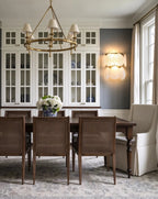 Modern Brass Shell Art Glass Wall Sconce in Dining Room Setting