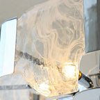 Close Up View of Alabaster Glass Panels and Chandelier Light Fixtures