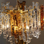 Detail View of Cascading Mixed Amber and Clear Art Glass Shades