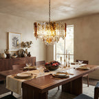 Modern Cascading Art Glass Chandelier Over Formal Dining Table