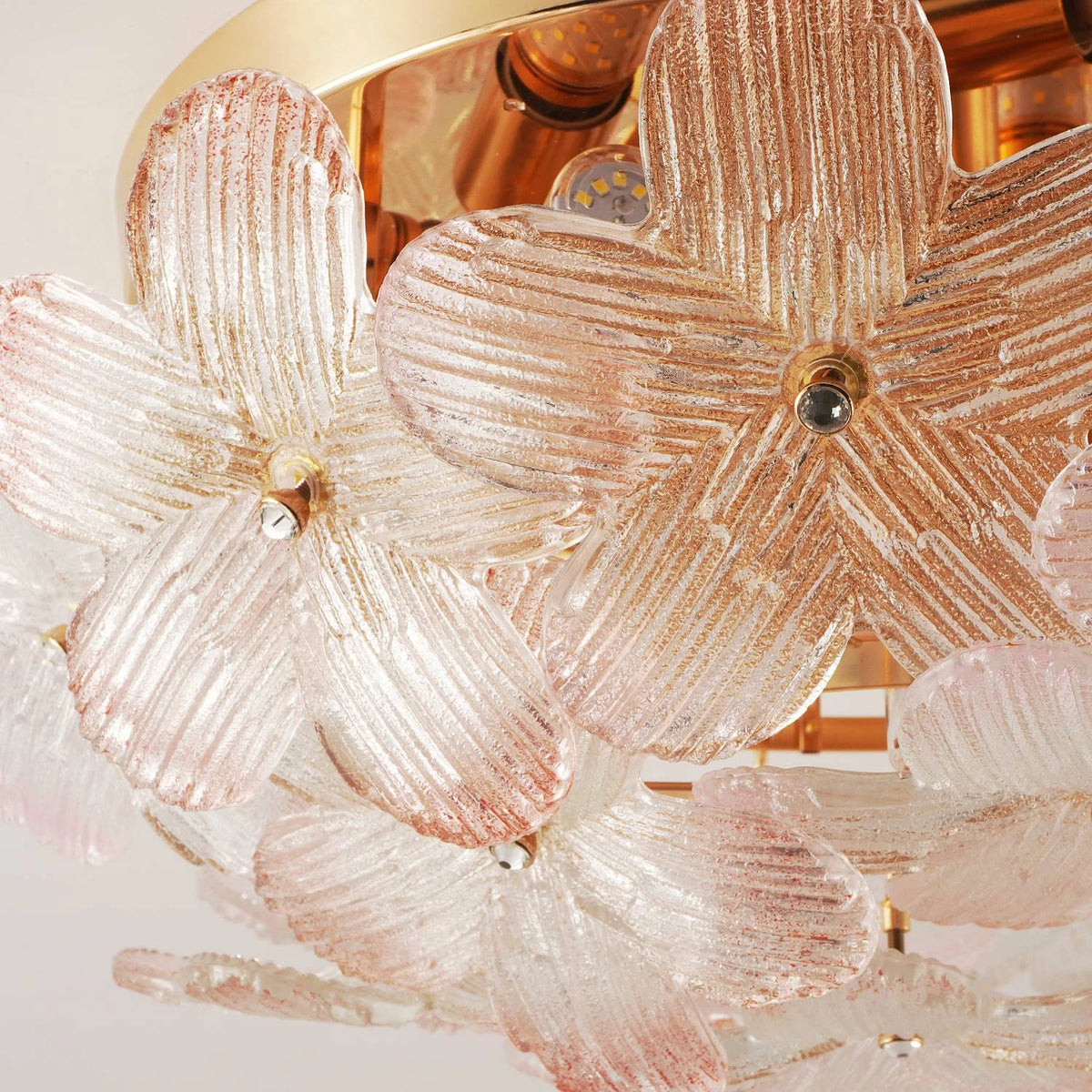 Close Up View of Pink Faceted Crystal Flower Petals and Brass Hardware