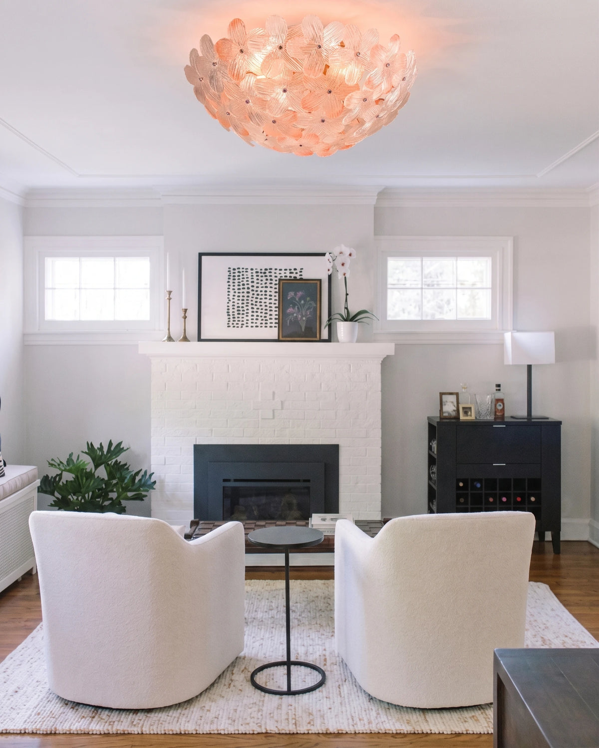 Modern Pink Crystal Floral Ceiling Light Over Fireplace Setting