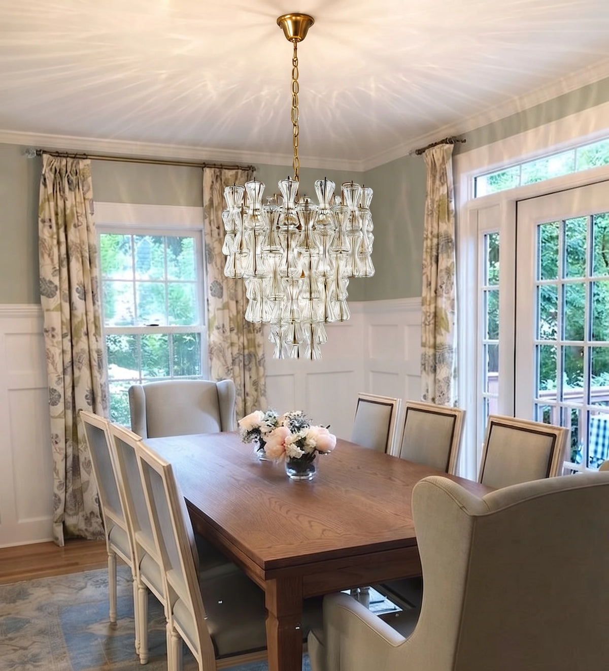 Modern Cascading Art Glass Chandelier Over Dining Room Table