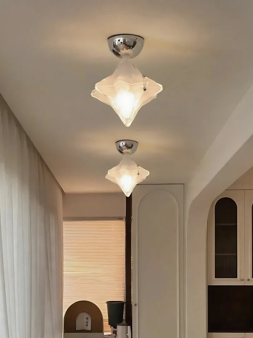 Modern Faceted Glass Ceiling Lights in Long Hallway