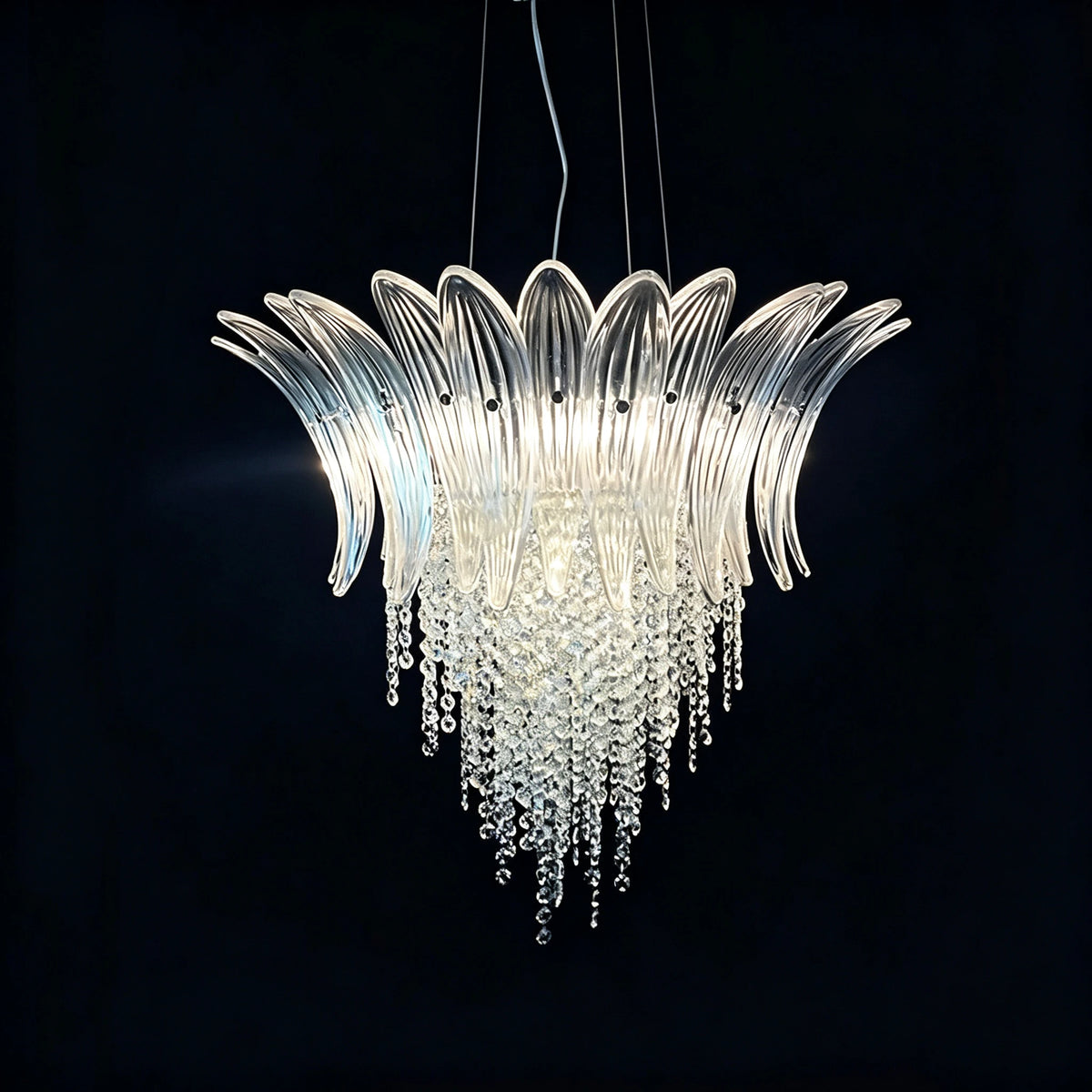 Angled View of Illuminated Modern Cascading Art Glass Chandelier