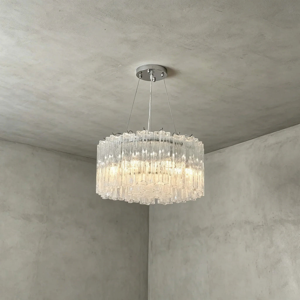 Side View of Illuminated Modern Cascading Cylindrical Glass Chandelier