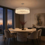 Modern Faceted Glass Chandelier Over Round Dining Table