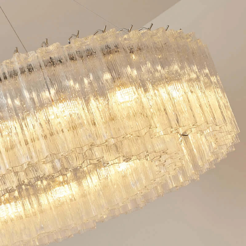 Bottom Up View of Illuminated Modern Cylindrical Faceted Glass Ceiling Light