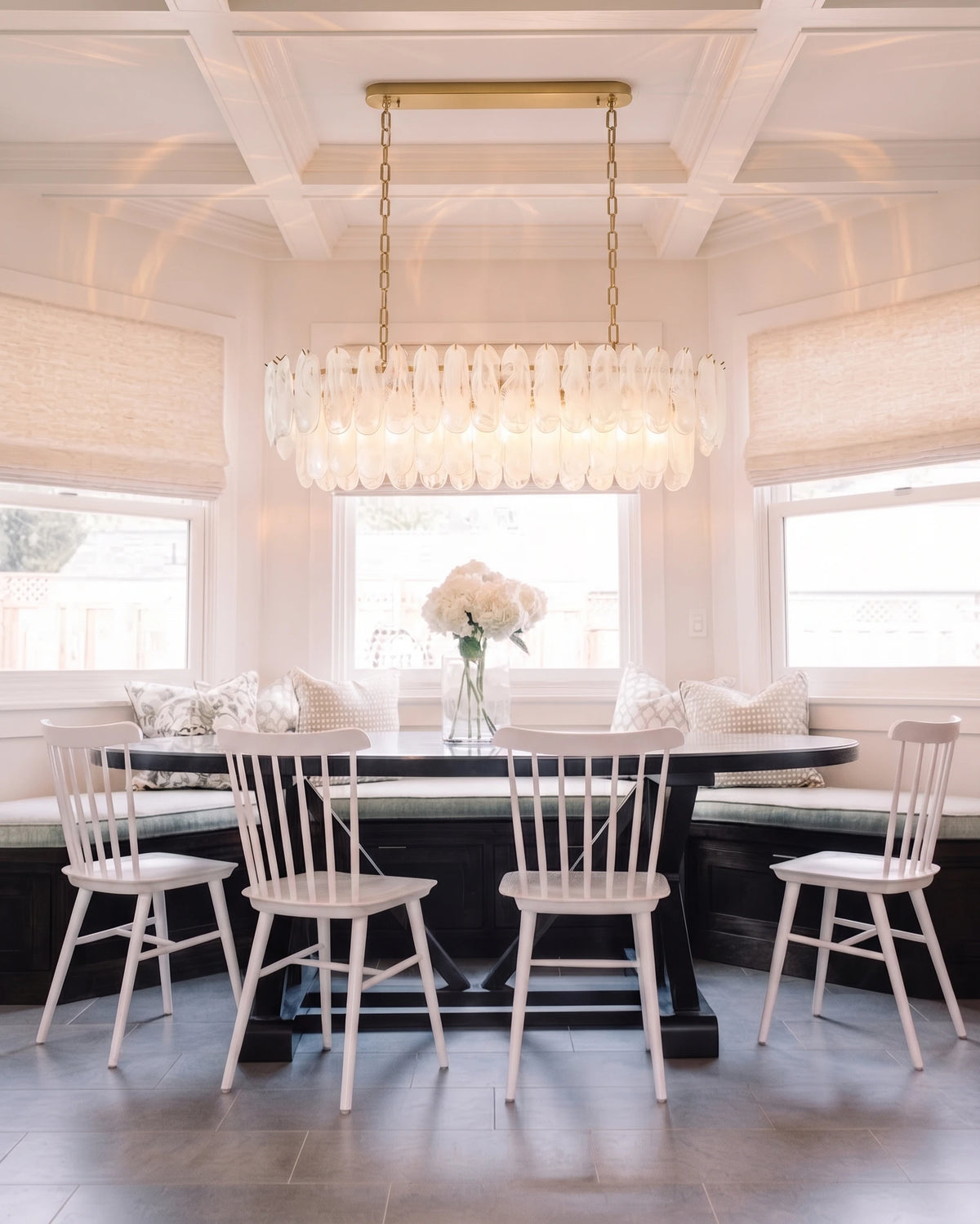 Modern White Glass Linear Chandelier Over Dining Room Table