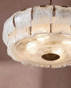 Bottom Up View of Illuminated White Ice Glass Circular Chandelier
