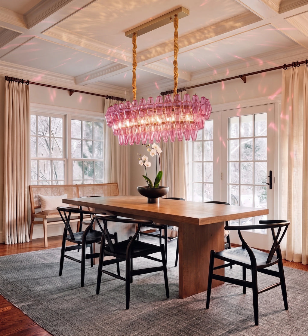 Modern Oval Pink Glass Chandelier Over Wooden Dining Table