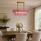 Modern Oval Pink Faceted Glass Chandelier Over Formal Dining Table
