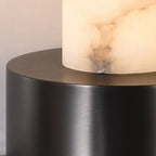 Close Up View of Modern Black Metal Base and Alabaster Connection Details