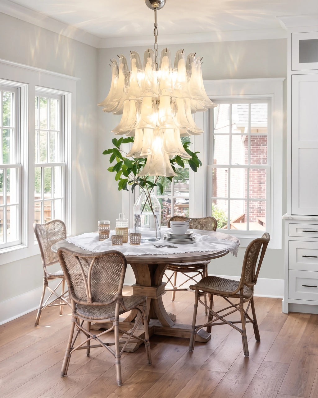 Modern Cascading Flower Art Glass Chandelier Over Wooden Dining Table