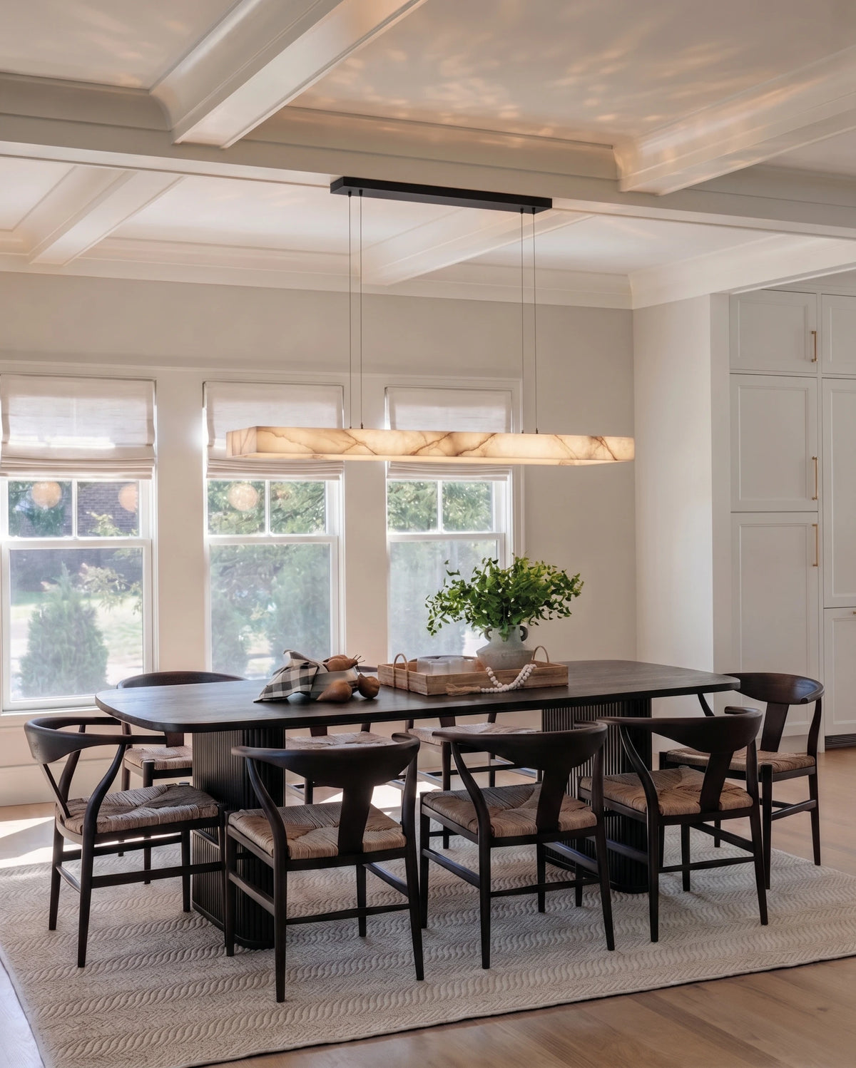 Traditional Alabaster Linear Pendant Light Over Dining Table