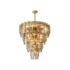 Modern Cascading Amber Faceted Glass Chandelier with Brass Stem on Pure White Background