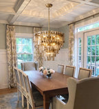 Modern Amber Faceted Glass Chandelier Over Wooden Dining Table