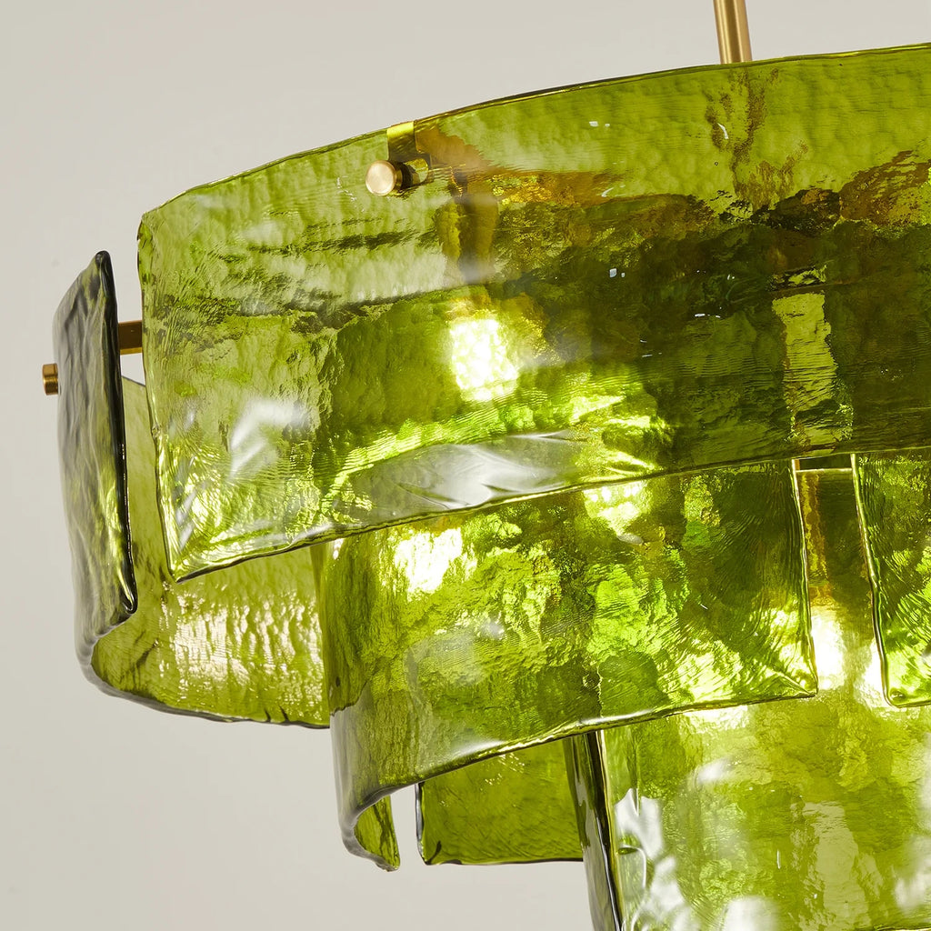 Close Up View of Glowing Green Art Glass Tiered Shade and Bulbs