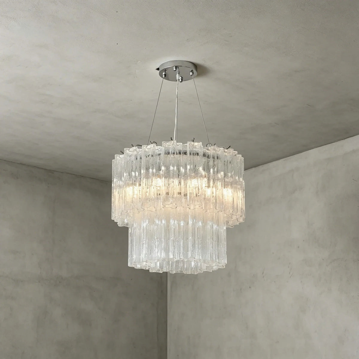 Side View of Illuminated Modern Cylindrical Faceted Glass Ceiling Light