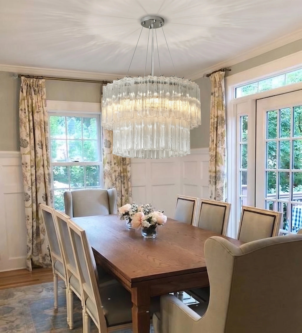 Modern Tiered Faceted Glass Chandelier Over Dining Area