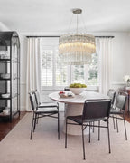 Modern Tiered Faceted Glass Ceiling Light Over Round Dining Table