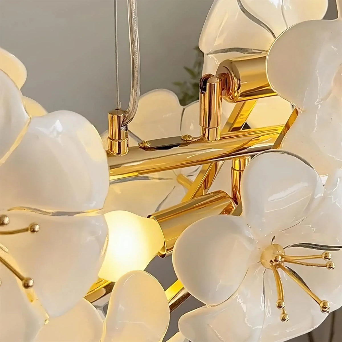 Detail View of Glowing Brass Frame and Internal Bulbs