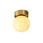 Modern Brass Alabaster Sphere Flush Mount Ceiling Light on White Background