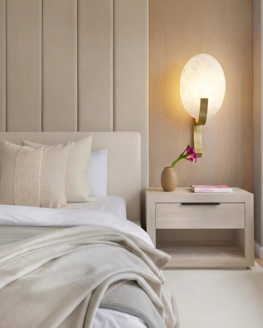 Modern Oval Alabaster Wall Sconce in Bedroom Interior