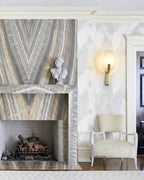 Modern Art Glass Wall Sconce Over Fireplace Setting