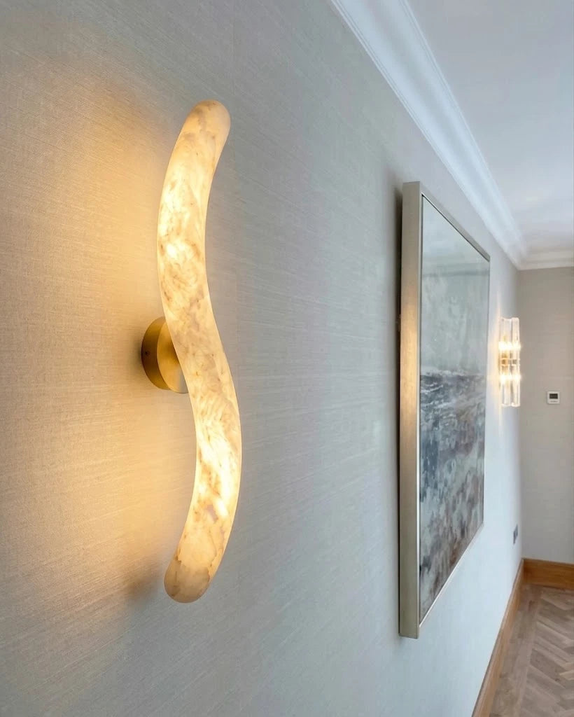 Illuminated Modern Alabaster Wall Sconce in Hallway Setting