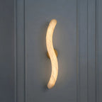 Illuminated Modern S-Curved Alabaster Wall Sconce Studio Shot