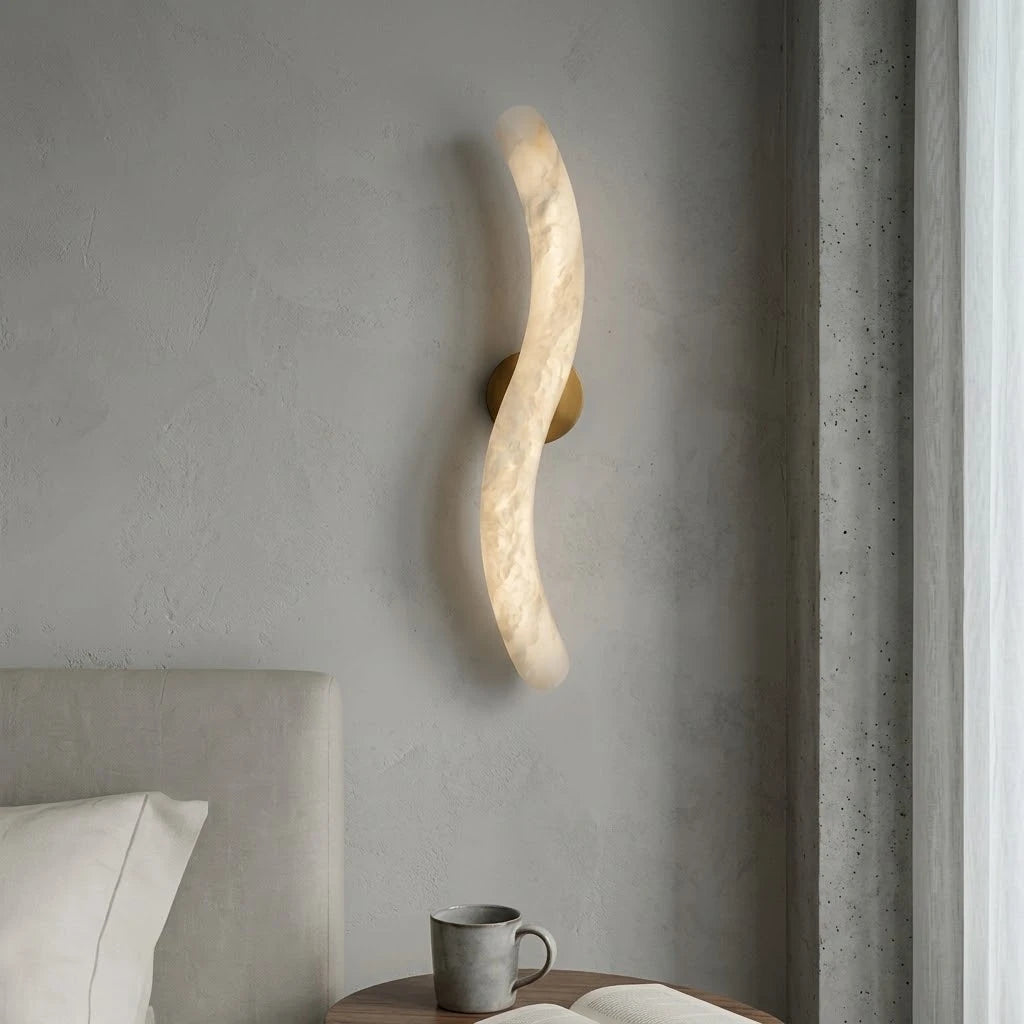 Modern S-Curved Alabaster Wall Sconce in Master Bedroom Setting