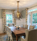 Modern Brass Feather Art Glass Chandelier in Elegant Dining Setting