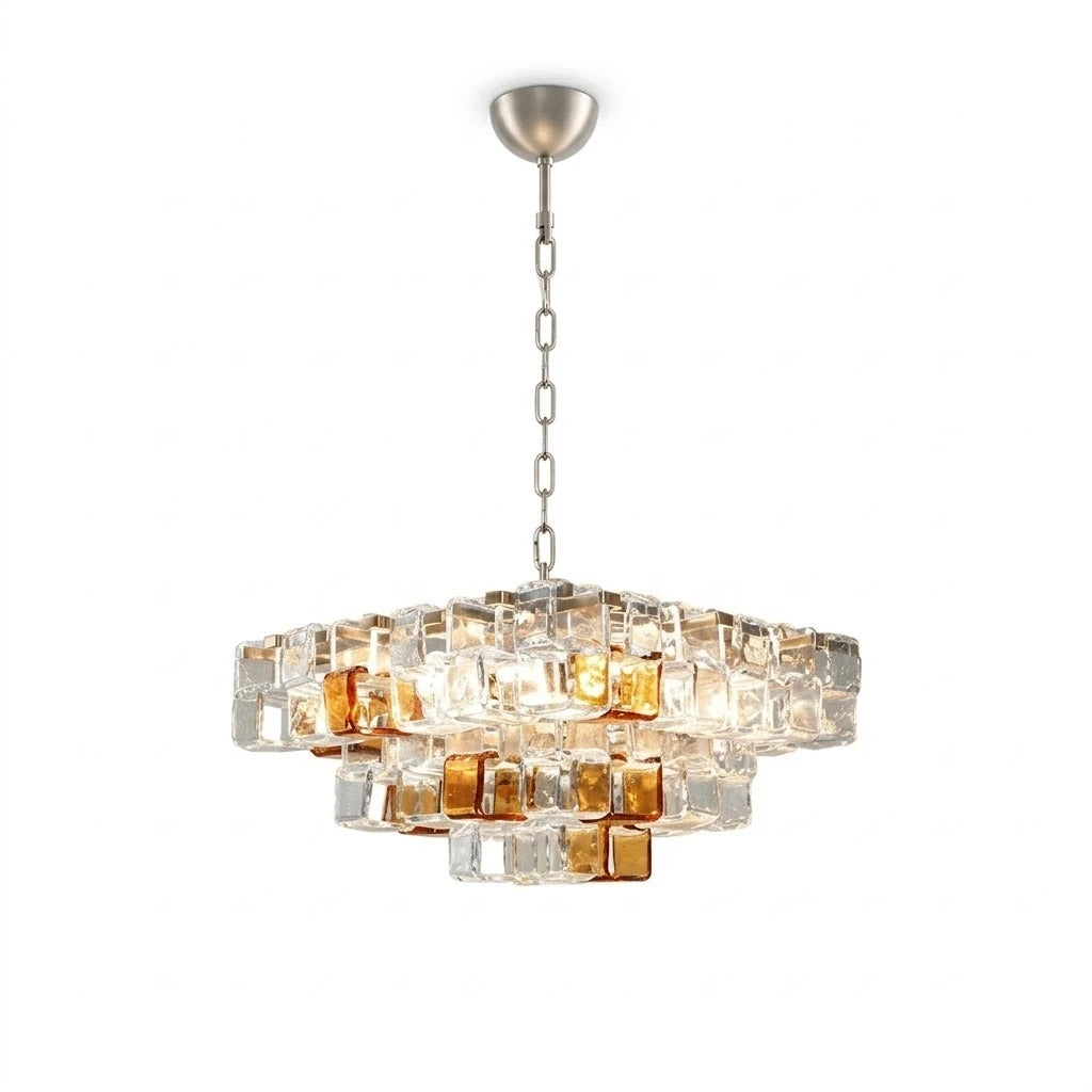 Modern Tiered Clear and Amber Art Glass Chandelier with Silver Chain on Pure White Background