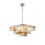 Modern Tiered Clear and Amber Art Glass Chandelier with Silver Chain on Pure White Background