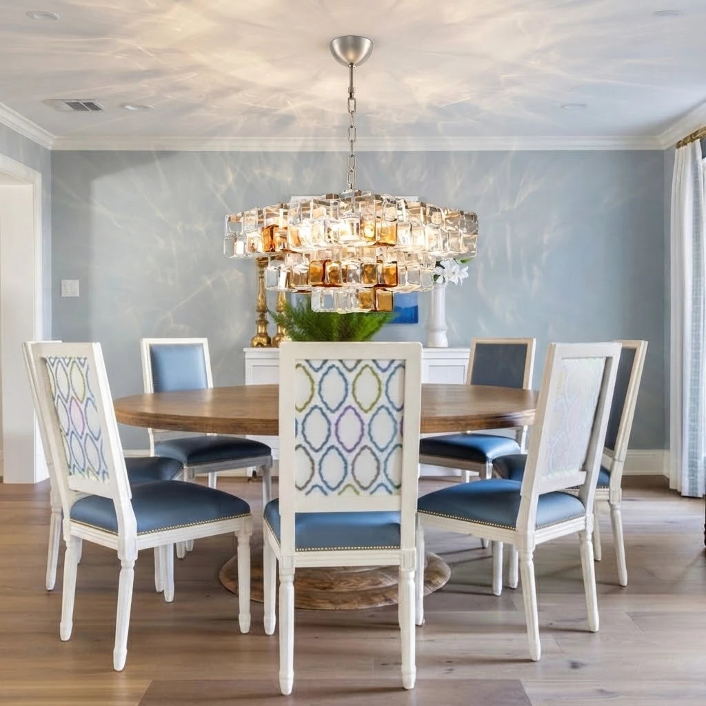 Modern Tiered Clear and Amber Art Glass Chandelier Over Dining Room Table