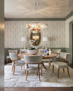 Modern Tiered Clear and Amber Art Glass Chandelier Over Round Dining Table